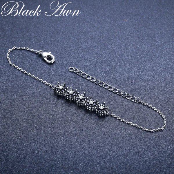 Womens BLACK AWN Silver Color Flower Bracelet